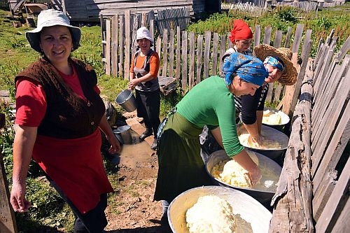 Georgian women churning butter