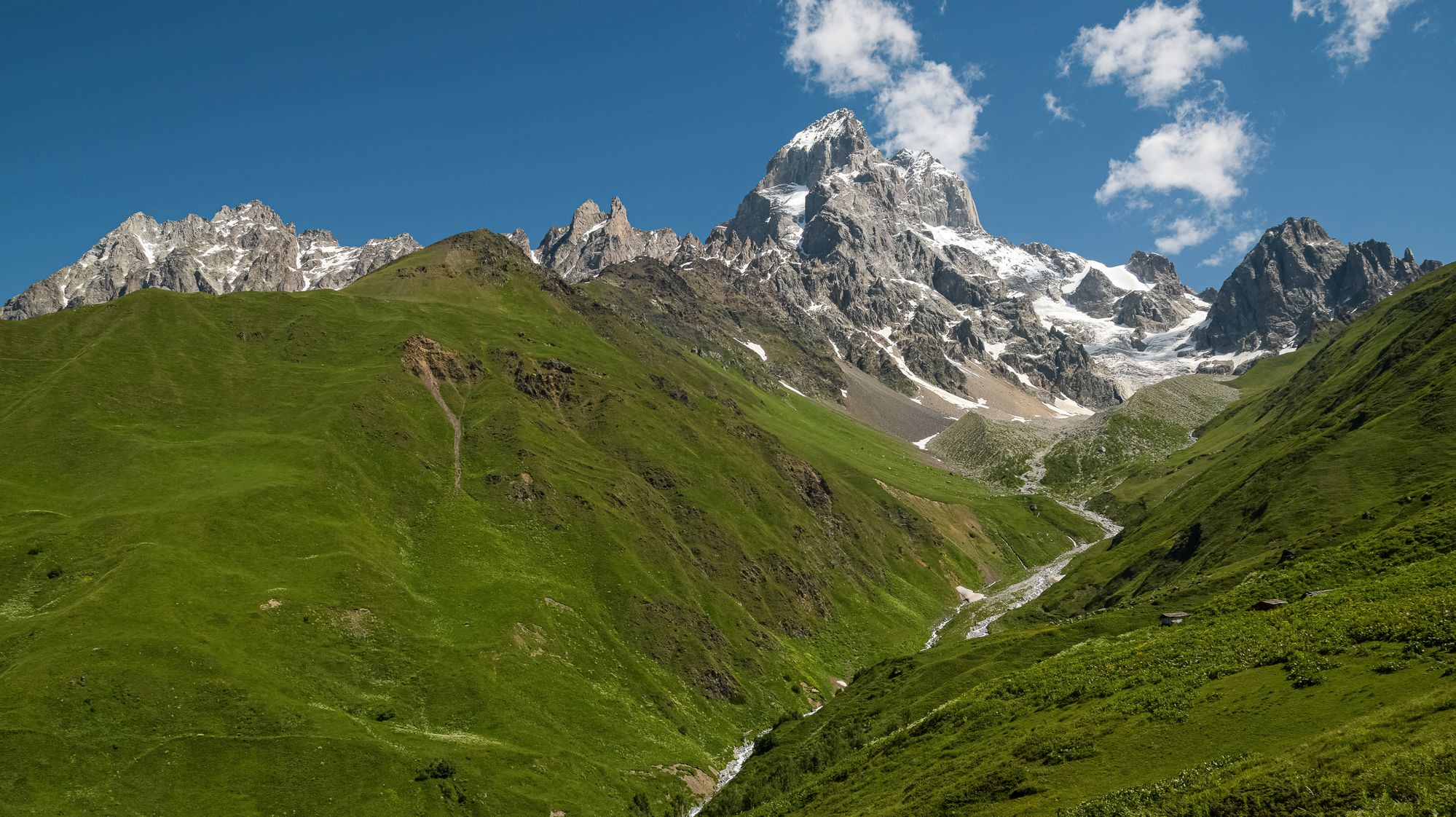 Hike climbs Gulichala valley towards the glacier